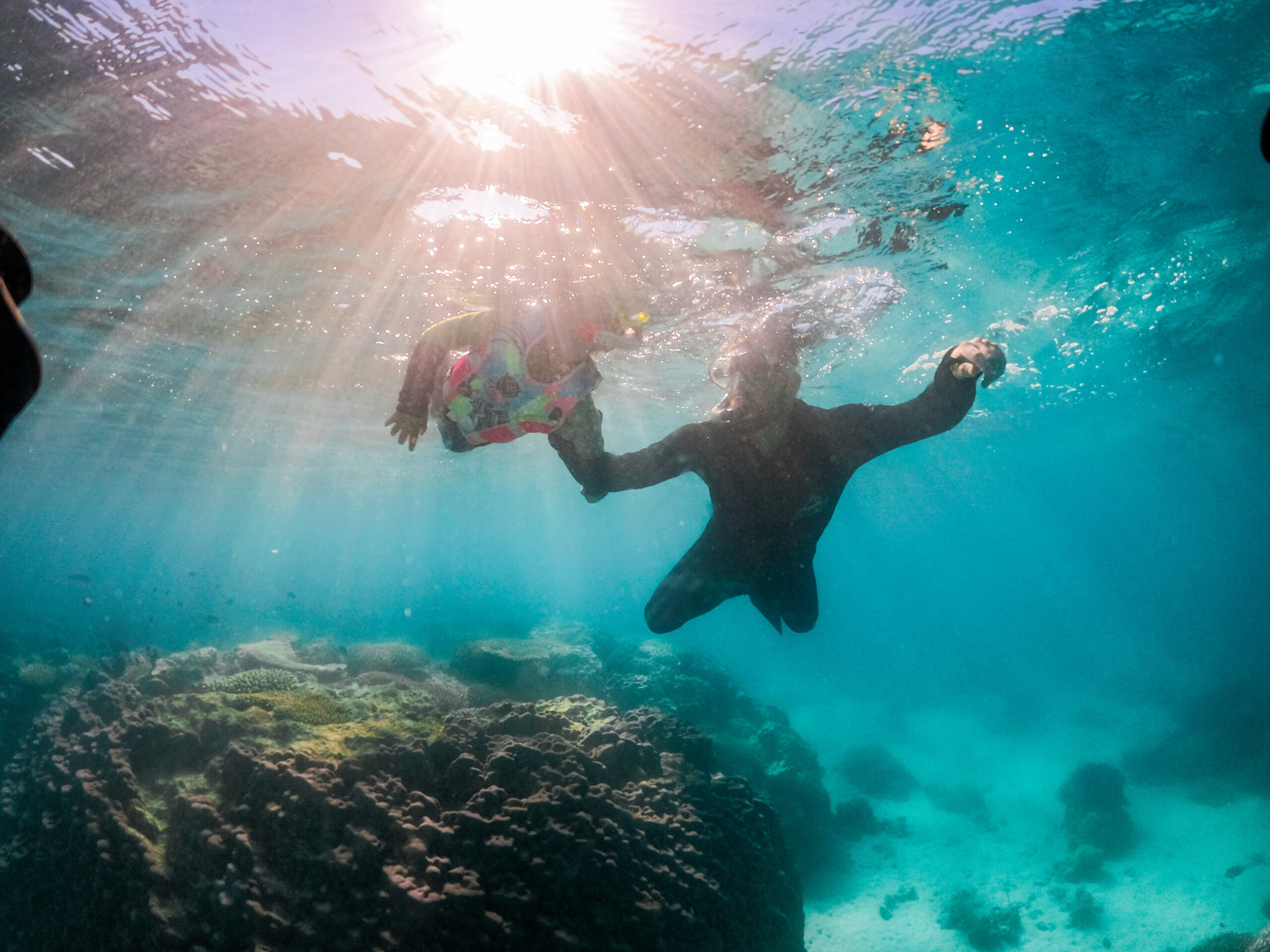 Young snorkeller taking part in guided underwater exploration